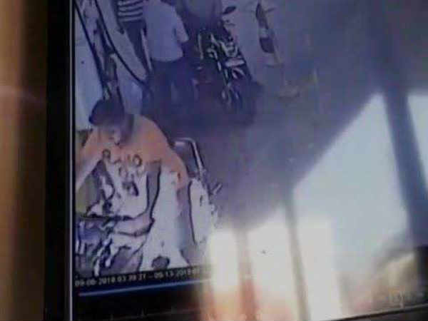 Bike catches fire in tamilnadu petrol pump, man injured Bike catches fire in tamilnadu petrol pump, man injured