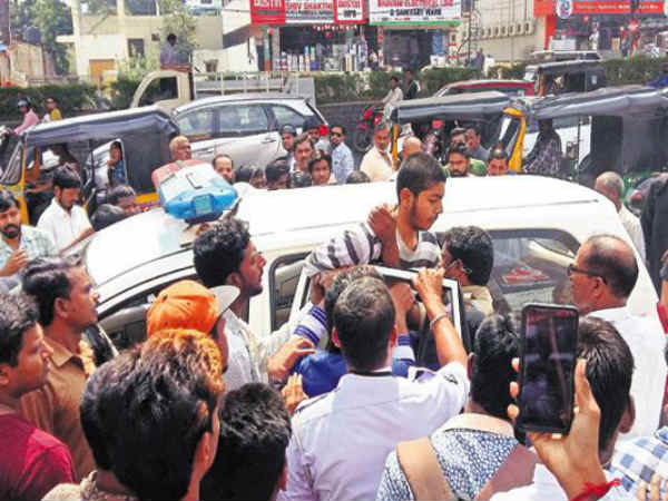 Teenager attacks traffic police at attapur in hyderabad Teenager attacks traffic police at attapur in hyderabad