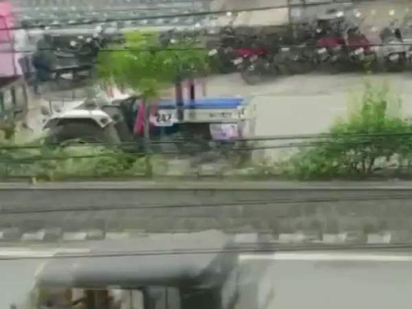 Dramatic visuals of a head on collision between a two wheeler and a mini truck Dramatic visuals of a head on collision between a two wheeler and a mini truck