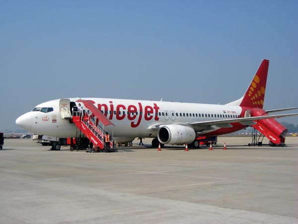Spicejet flight mkaes emergency landing at Varanasi, after a passsenger suffers heart stroke Spicejet flight mkaes emergency landing at Varanasi, after a passsenger suffers heart stroke