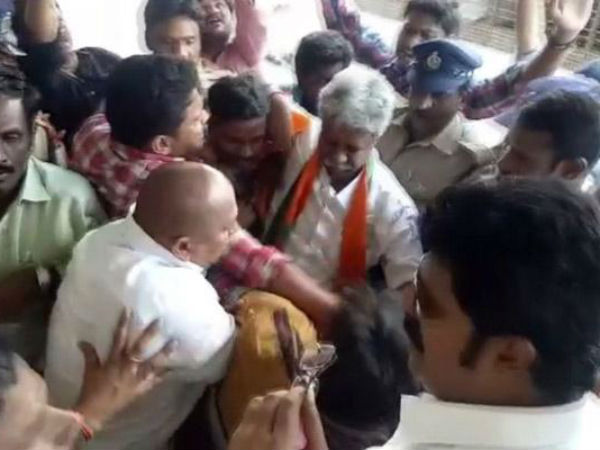 Police rude behaviour with BJP MLA Manikyala Rao Police rude behaviour with BJP MLA Manikyala Rao