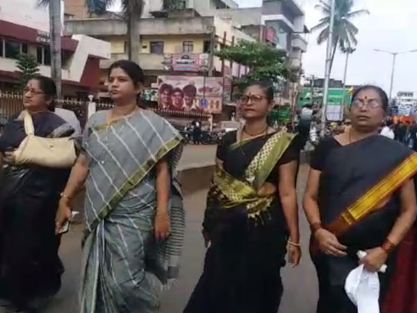 Karnataka former MLAs Sambhaji Patil and Manohar Kinekar celebrates a dark day in Belagavi. Karnataka former MLAs Sambhaji Patil and Manohar Kinekar celebrates a dark day in Belagavi.