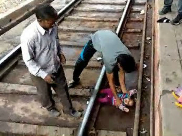 On Camera, One Year Old Escapes Unhurt As Train Passes Over Her In UP On Camera, One Year Old Escapes Unhurt As Train Passes Over Her In UP