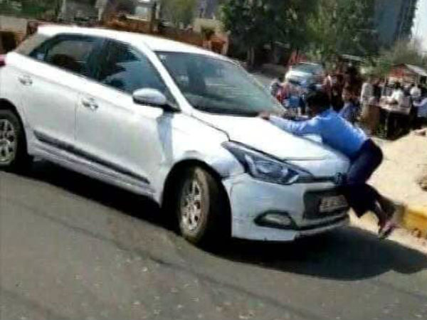 Man clings to car’s bonnet for nearly 2 km in road rage case near Delhi Man clings to car’s bonnet for nearly 2 km in road rage case near Delhi