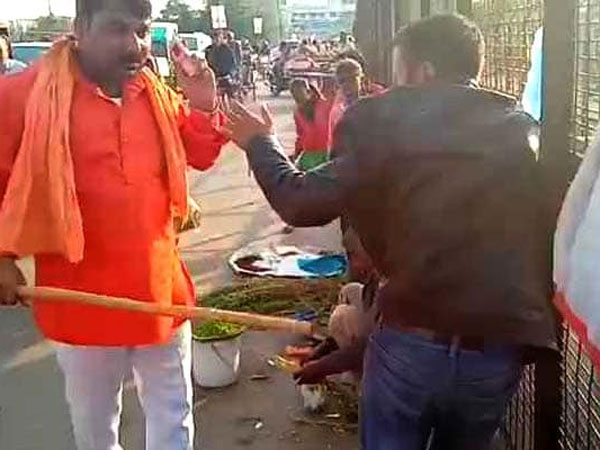 కర్రతో చితక్కొట్టారు ..