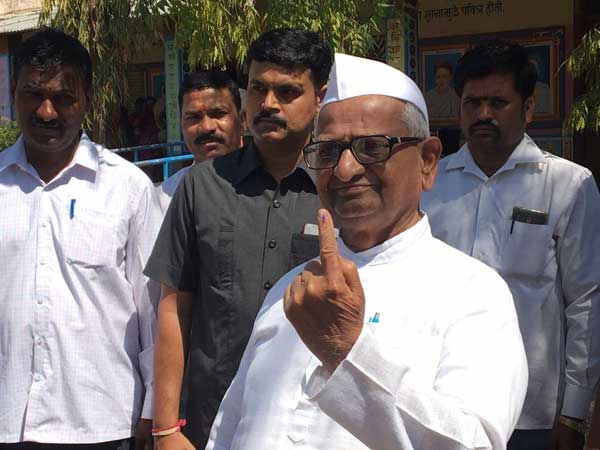 Social activist Anna Hazare in Maharashtra and Narendra Modis mother, Heeraben in Gujarat cast their Votes Social activist Anna Hazare in Maharashtra and Narendra Modis mother, Heeraben in Gujarat cast their Votes