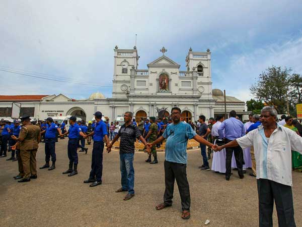 Sri Lanka detains Syrian in investigation of blasts; toll rises to 321 Sri Lanka detains Syrian in investigation of blasts; toll rises to 321