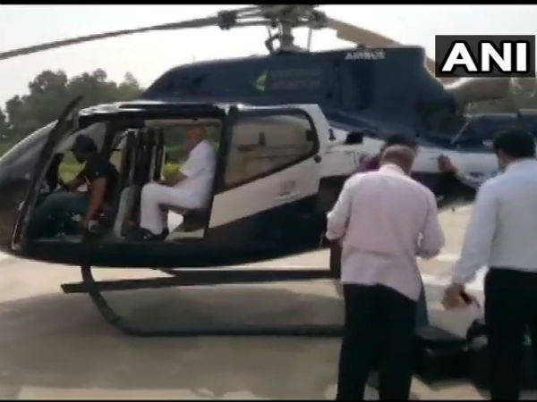 EC flying squad checks luggage of former CM Yeddyurappa at helipad in Shivamogga EC flying squad checks luggage of former CM Yeddyurappa at helipad in Shivamogga