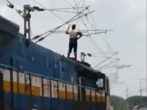 Man commits suicide by touching high-tension line in Bengaluru railway station Man commits suicide by touching high-tension line in Bengaluru railway station