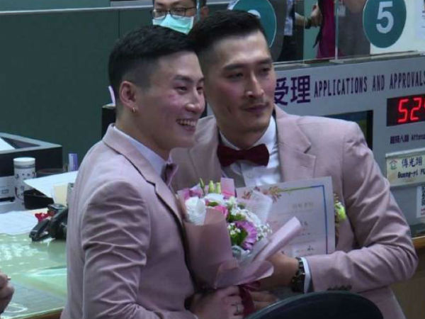 Asias first legal gay weddings as same-sex couples Asias first legal gay weddings as same-sex couples