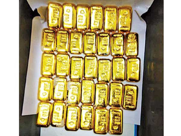 three kg above gold seized from singapore person at shamshabad airport three kg above gold seized from singapore person at shamshabad airport