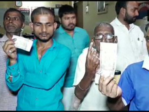 Residents of UP village allege conspiracy, say ink applied to finger before voting Residents of UP village allege conspiracy, say ink applied to finger before voting