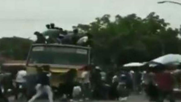 Students fall from the bus top during Bus day celebrations in Chennai Students fall from the bus top during Bus day celebrations in Chennai