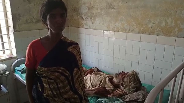 వారం రోజులుగా నరకయాతన.. చెట్టు కిందే జీవితం