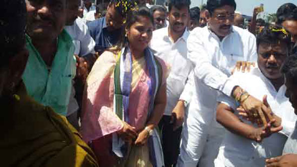 AP Deputy CM Pushpa Srivani have a narrow escape after a stage collapse AP Deputy CM Pushpa Srivani have a narrow escape after a stage collapse