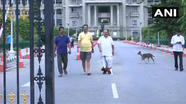 Karnataka BJP legislators go for morning walk in Assembly premises in Bengaluru after protest over night dharna Karnataka BJP legislators go for morning walk in Assembly premises in Bengaluru after protest over night dharna