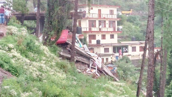 more than 30 people are feared stuck under the a guest house building collapsed more than 30 people are feared stuck under the a guest house building collapsed
