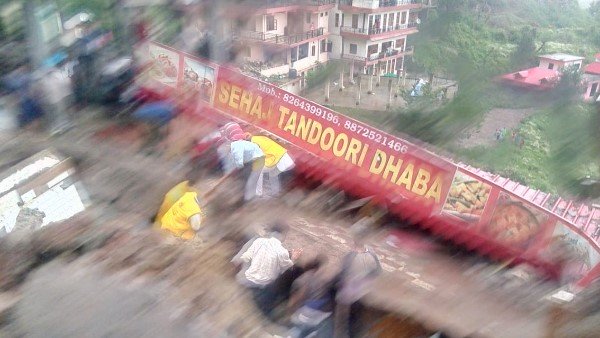more than 30 people are feared stuck under the a guest house building collapsed more than 30 people are feared stuck under the a guest house building collapsed