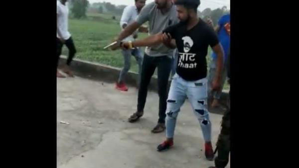 Man arrested for cutting Birthday cake with desi gun, video goes viral Man arrested for cutting Birthday cake with desi gun, video goes viral