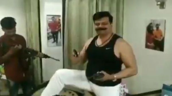 BJP MLA dances to Karan Arjun songs with guns in hand BJP MLA dances to Karan Arjun songs with guns in hand