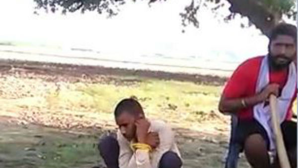 Father and son thrashed, made to do sit ups by locals Father and son thrashed, made to do sit ups by locals