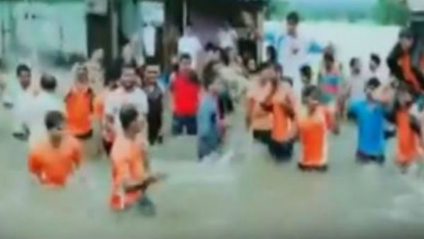dance in flood water karnataka yamagarni villagers viral video dance in flood water karnataka yamagarni villagers viral video