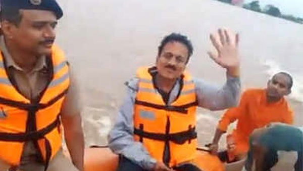 Maharashtra minister selfie videos controversy in flood affected areas tour Maharashtra minister selfie videos controversy in flood affected areas tour