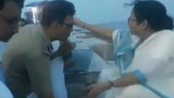 IPS officer touches Bengal CM Mamata Banerjees feet in uniform, courts controversy IPS officer touches Bengal CM Mamata Banerjees feet in uniform, courts controversy