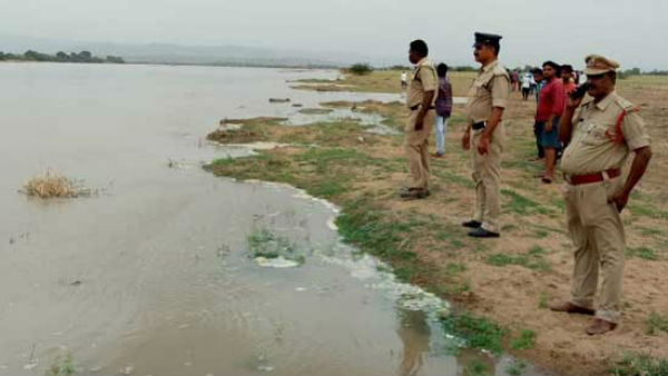 family washed in river.. one dead, another missing family washed in river.. one dead, another missing
