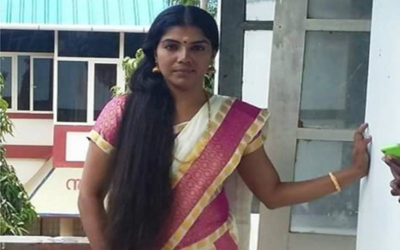 Kerala Police woman Cop donated her hair for cancer patients Kerala Police woman Cop donated her hair for cancer patients