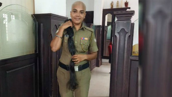 Kerala Police woman Cop donated her hair for cancer patients Kerala Police woman Cop donated her hair for cancer patients