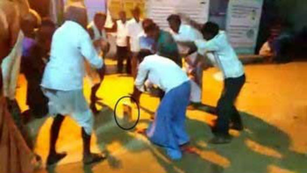 sarpanch and his followers played bahtukamma with liquor bottles became controversy sarpanch and his followers played bahtukamma with liquor bottles became controversy