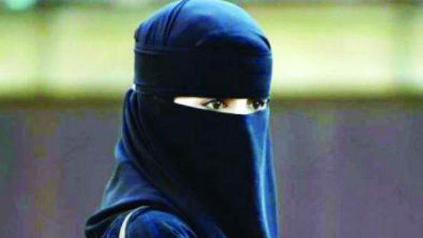 US Woman detained by police for abusing doctor wearing Burqa US Woman detained by police for abusing doctor wearing Burqa