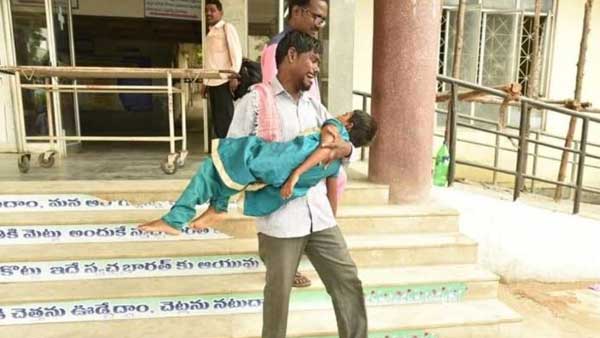 Telangana man forced to carry 7-yr-old daughters dead body as hospital refuses ambulance Telangana man forced to carry 7-yr-old daughters dead body as hospital refuses ambulance