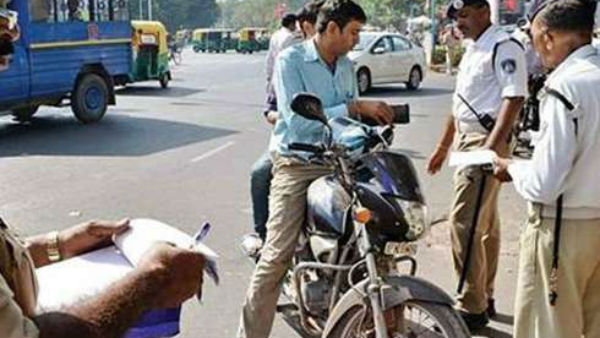 గుజరాత్లో 50శాతం మేర తగ్గించిన జరిమానాలు
