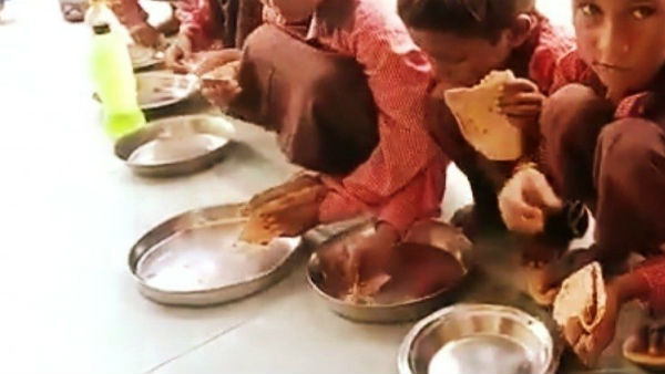 UP journalist booked for reporting on salt, roti being served as Mid-day meal UP journalist booked for reporting on salt, roti being served as Mid-day meal