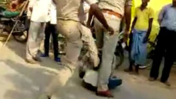 uttar pradesh police thrashed Man alleged traffic violation uttar pradesh police thrashed Man alleged traffic violation