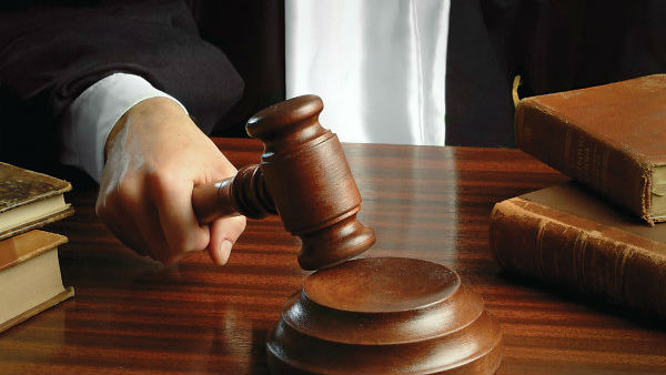 A Thai judge shot himself in the chest in a court A Thai judge shot himself in the chest in a court