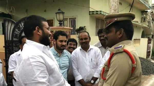 YSRCP MLA Jakkampudi Raja hugged with Sub Inspector, who attacked earlier YSRCP MLA Jakkampudi Raja hugged with Sub Inspector, who attacked earlier