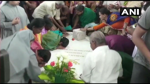 People gather at the shrine of Mother Mariam Thresia at Kuzhikkattussery in Thrissur People gather at the shrine of Mother Mariam Thresia at Kuzhikkattussery in Thrissur