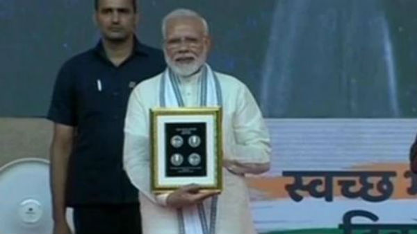 Modi release commemorative Rs 150 coin on Gandhi birth anniversary Modi release commemorative Rs 150 coin on Gandhi birth anniversary