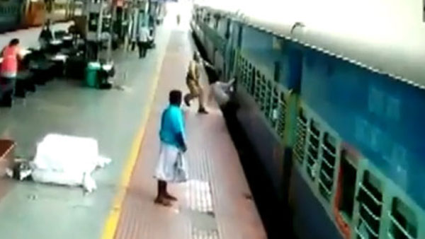 RPF personnel saved a passenger from slipping under a moving train RPF personnel saved a passenger from slipping under a moving train
