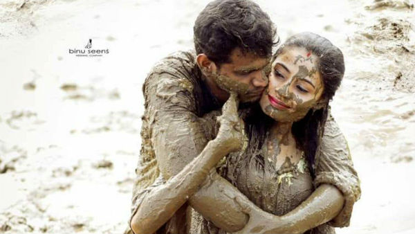 బురదలో పొర్లుతూ పోస్ట్ వెడ్డింగ్ షూట్