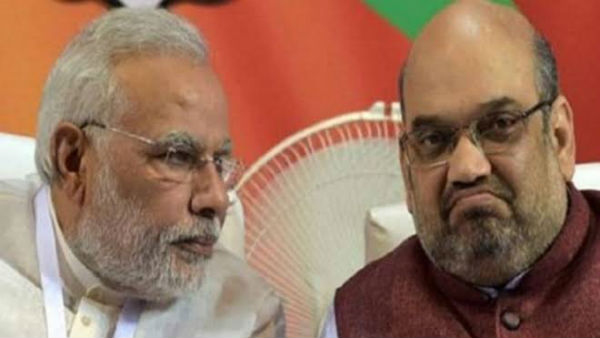 మోడీ వల్లే షా వెనక్కి తగ్గారా?