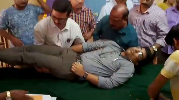 Karnataka: Uttara Kannada DC Harish Kumar unconscious on the dias Karnataka: Uttara Kannada DC Harish Kumar unconscious on the dias
