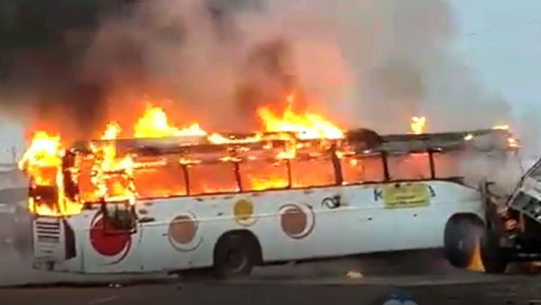 tourist bus met with an accident and caught fire at Pydibimavaram in Srikakulam district tourist bus met with an accident and caught fire at Pydibimavaram in Srikakulam district