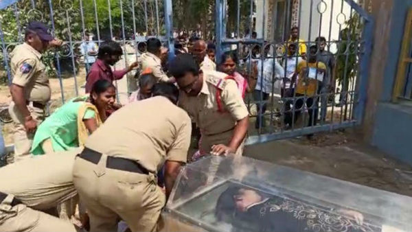 బూటు కాలితో తన్ని ఈడ్చిపారేసిన పోలీ