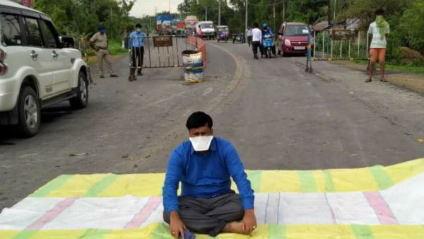 Bengal BJP MP sits on road to protest against harassment by Trinamool govt.. Bengal BJP MP sits on road to protest against harassment by Trinamool govt..