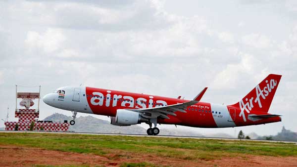 Air Asia flight with 76 onboard makes emergency landing at Hyderabad airport Air Asia flight with 76 onboard makes emergency landing at Hyderabad airport