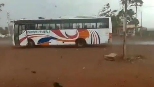 Heavy winds forced a bus to move back in sathupalli in khammam district. Heavy winds forced a bus to move back in sathupalli in khammam district.
